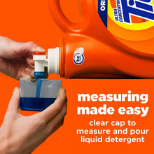Tide liquid detergent with clear measuring cup and white dispensing cap