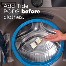 Laundry detergent pacs ad showing detergent pods placed in a washing machine drum