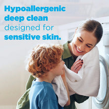 Hypoallergenic laundry detergent pacs ad with smiling woman holding a child