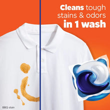 White polo shirt with stain spots and blue-and-white Tide PODS detergent pac