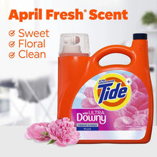 Orange Tide liquid detergent bottle with Ultra Downy label and April Fresh scent callouts