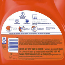 Back label of orange Tide liquid detergent bottle with bar code and usage text