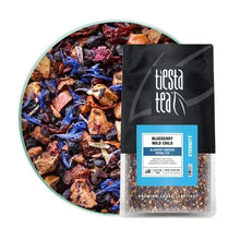 Loose leaf herbal tea bag labeled Blueberry Wild Child, beside a bowl of loose tea.
