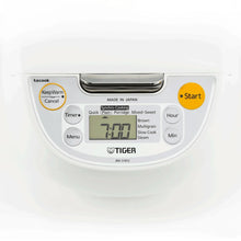White rice cooker control panel with LCD display and Start button