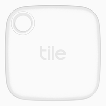 White Tile Mate Bluetooth tracker, square with a round hole on top-left.