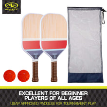Pickleball paddle set with two wooden paddles, two red balls, and mesh carry bag