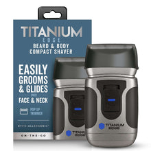 Compact electric beard and body shaver with pop-up trimmer, titanium edge foil, dark gray