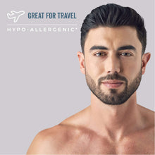 Man with neatly trimmed beard and clean neck line, front-facing grooming pose
