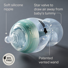 Clear and teal anti-colic baby bottle with soft silicone nipple and vented anti-colic design