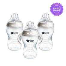 Clear 11oz baby feeding bottles with soft breast-like silicone nipples, three-pack