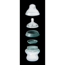 Tommee Tippee baby bottle parts: teal cap, nipple, anti-colic valve, and bottle base