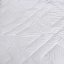 White down-alternative comforter close-up of quilted channels and baffle stitching