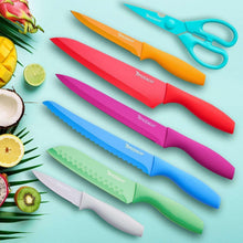 Colorful kitchen knives laid out in rows, including red, purple, and green