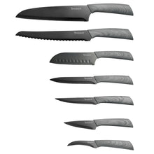 Assorted knives with grey damascus-look handles and dark blades