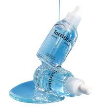 Light-blue hyaluronic acid serum bottle with white dropper and clear liquid