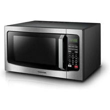 Stainless steel Toshiba countertop microwave oven with keypad and digital display on door