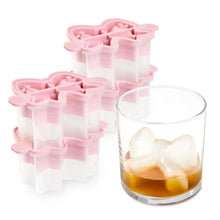 Pink silicone bow ice mold with four bow-shaped cavities