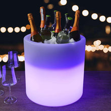 LED beverage tub with purple glow, holding champagne bottles and ice
