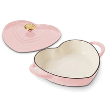 Heart-shaped dutch oven with pink exterior and cream interior, with matching lid