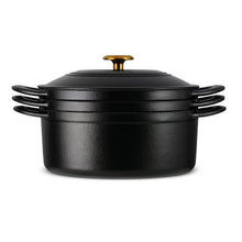Black enamel cast iron cookware pot with gold knob lid, stack-ready handles