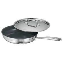 Covered and uncovered frying pans set with dark nonstick interiors and lids