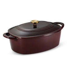 Burgundy enameled cast iron Dutch oven with gold knob and side handles