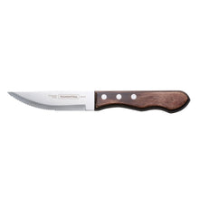 Steak knife with dark wood handle and scalloped stainless blade, side view
