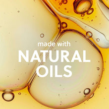 Golden moisturizing shave oil droplet with bubbles, close-up texture