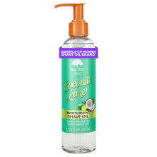 Tree Hut moisturizing shave oil bottle with orange pump and green coconut lime label