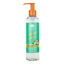 Tree Hut moisturizing shave oil bottle with orange pump and green coconut lime front label