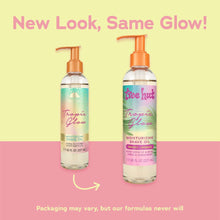Two moisturizing shave oil bottles with orange pumps, clear liquid, Tropical Glow labels