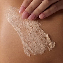 Golden Vanilla scrub applied to skin with a thick, creamy texture