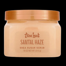 Santal Haze shea sugar body scrub jar with amber lid, cream scrub contents