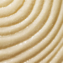 Vanilla shea sugar scrub cream texture with sugar granules