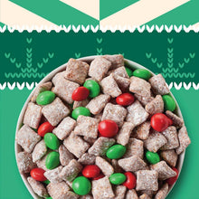 Rice cereal in a bowl with red and green candy-coated pieces