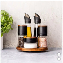 Wood lazy Susan seasoning station with 6 clear spice jars and black lids