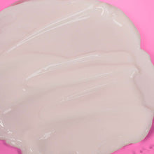 Shave cream gel spread, smooth glossy white layer with swirl lines