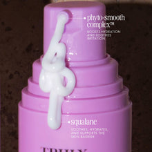 Hydra-Smooth shave cream bottle with white cream swirl on front, pink