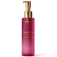 TRULY unicorn fruit luxury shave oil bottle with gold pump, magenta glass