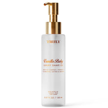 Truly Vanilla Baby luxury shave oil bottle with gold pump; white bottle