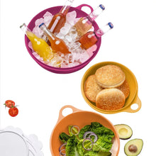 Purple and orange Thatsa bowls with food portions