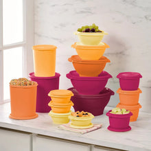 Food storage container set with orange and magenta stackable cups and lids