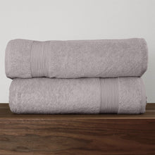 Light grey Turkish towel set with two bath sheets folded and ribbed trim bands