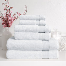 Folded light grey Turkish towel set with neat striped bands, bath towel stack