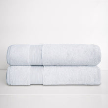 White Turkish towel set with two bath sheets folded and ribbed trim bands