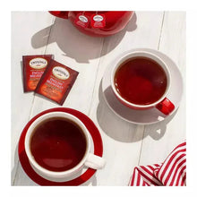 Twinings English Breakfast tea cups with dark tea and small tea bags