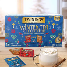 Winter tea collection gift set box with tea sachets and a cup nearby.