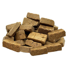 Freeze-dried beef liver treat cubes pile, small brown blocks.