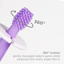 Purple silicone training toothbrush with gently rotating bristle head for 360° brushing