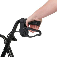 Rolling walker handle grip with black lever brake near the handrail